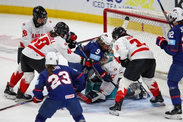 November 8th 2025: Team USA forward Kirsten Simms (9) is crosschecked into the Team Canada goaltender in the second period. Team USA WomenÃ¢â‚¬â ¢s national team, Nationalteam hosted the Canadian WomenÃ¢â‚¬â ¢s National Team in a Canada USA Rivalry Series game at Key Bank Center in Buffalo, New York. ( CSM) - ZUMAc04_ 20251108_zma_c04_462 Copyright: xJonathanxTencax
