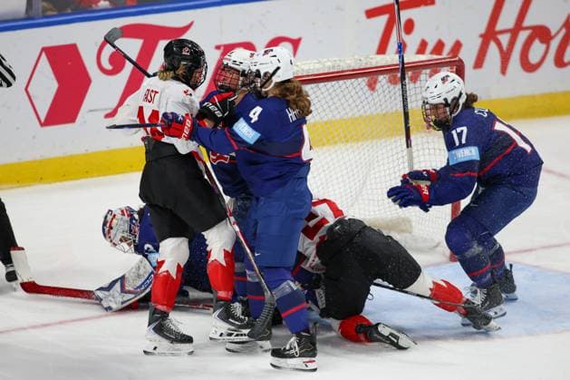 November 8th 2025: Team USA defenseman Caroline Harvey (4) and Haley Winn (4) battle with Team Canada defenseman Renata Fast (14) in the second period. Team USA WomenÃ¢â‚¬â ¢s national team, Nationalteam hosted the Canadian WomenÃ¢â‚¬â ¢s National Team in a Canada USA Rivalry Series game at Key Bank Center in Buffalo, New York. ( CSM) - ZUMAc04_ 20251108_zma_c04_507 Copyright: xJonathanxTencax