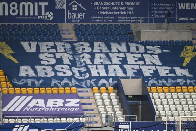 Empty stands with banners and advertising at Ernst Abbe Sportfeld Empty stands with banners Copyright: xSpeedshotx