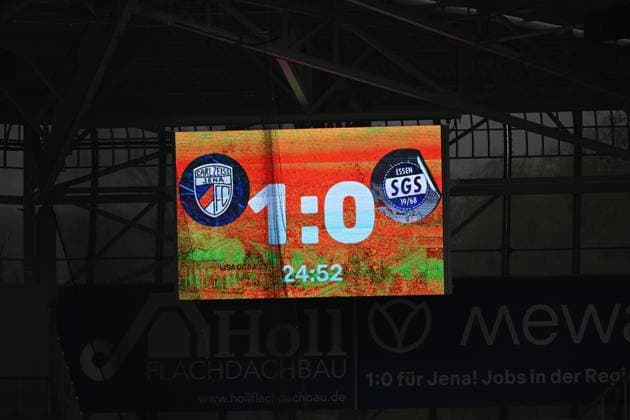 Scoreboard shows 1 0 lead for SGS Essen against FC Carl Zeiss Jena at Ernst Abbe Sportfeld Score 1 0 for SGS Essen Copyright: xSpeedshotx