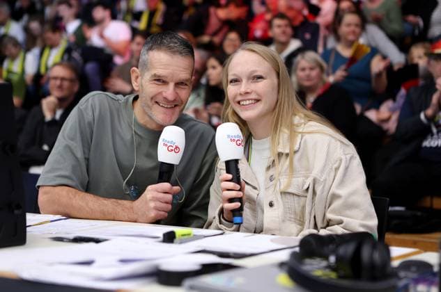 BAU 09 11 2025 Göppingen Artistic Cycling UCI Indoor Cycling World Championships 2025, from left presenter Jens Zimmermann and artistic cyclist Lara Füller