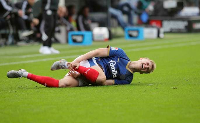 Photo devastated is Kasper Davidsen Kiel after collision with Christian Rasmussen Fortuna Football 2 Bundesliga , Matchday 12 on Sun 09 11 2025 Holstein Kiel Fortuna Düsseldorf