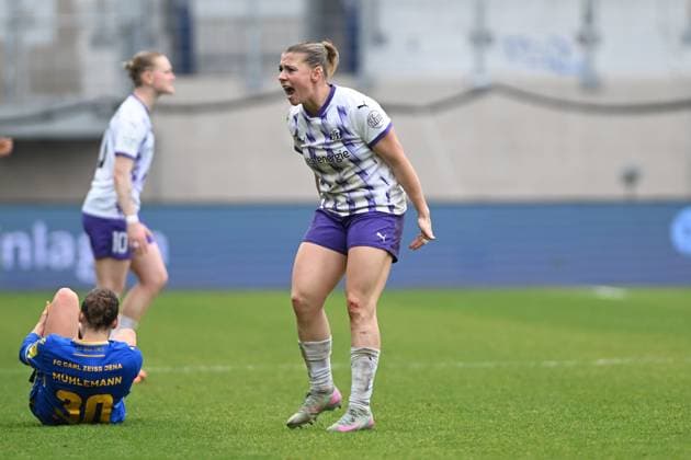 Ramona Maier 9 SGS Essen shows intense emotion while Elena Mühlemann 30 FC Carl Zeiss Jena lies on the ground Intense reaction on the pitch Copyright: xSpeedshotx