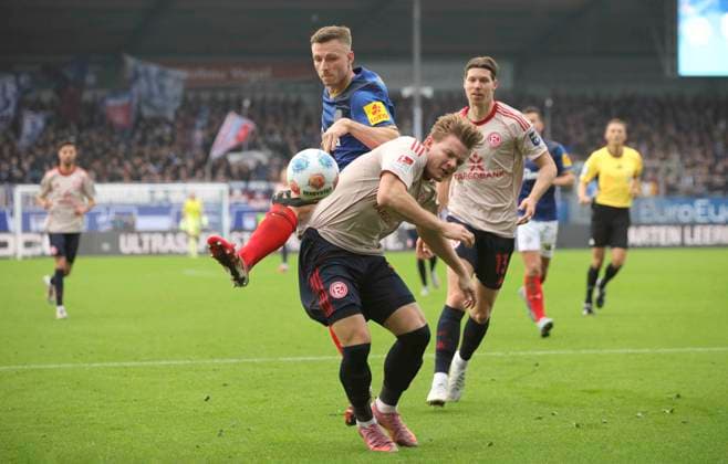 Photo Carl Anders Johansson Kiel vs Christian Rasmussen Fortuna Soccer 2 Bundesliga , Matchday 12 on Sun 09 11 2025 Holstein Kiel Fortuna Düsseldorf