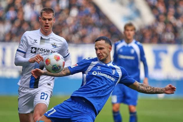 Magdeburg, Saxony-Anhalt, Germany, 09 11 2025 Avnet Arena 12 Matchday, Season 2025 26, 2 Soccer Bundesliga 1 FC Magdeburg SC Paderborn Steffen Tigges 27, SC Paderborn 07 and Falko Michel 21, 1 FC Magdeburg in a duel Copyright: xdtsxNachrichtenagenturx dts_92846