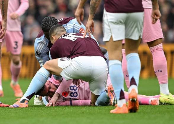 Birmingham, England, 9th November 2025. Adam Smith of Bournemouth goes down with an injury during the Aston Villa vs AFC Bournemouth Premier League match at Villa Park, Birmingham. Picture credit should read: Cody Froggatt Sportimage EDITORIAL USE ONLY. No use with unauthorised audio, video, data, fixture lists, club league logos or live services. Online in-match use limited to 120 images, no video emulation. No use in betting, games or single club league player publications. SPI_015_CF_ASTON_VILLA_V_BOURNEMOUTH SPI-4279-0015