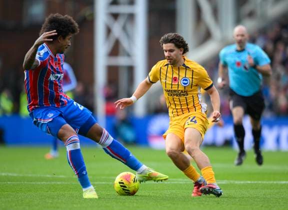 Crystal Palace v Brighton and Hove Albion Premier League Chris Richards of Crystal Palace and Ferdi Kadioglu of Brighton and Hove Albion battle for the ball during the Premier League match at Selhurst Park, London UK Newspapers OUT Copyright: xMalcolmxFellx FIL-22486-0025