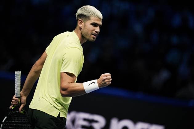 Spain s Carlos Alcaraz react during the singles tennis match of the ATP, Tennis Herren World Tour Finals against Australia s Alex de Minaur at the Inalpi Arena in Turin, Italy - Sunday, Nov. 9, 2025. - .  Copyright: xMarcoxAlpozzi LaPressex