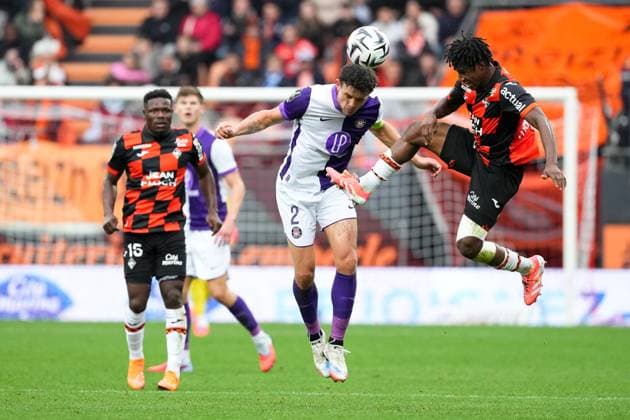 FC Lorient v Toulouse FC - Ligue 1 McDonald s 2025 2026 29 Karim DERMANE (fcl) - 02 Rasmus Schmidt NICOLAISEN (tfc) during the Ligue 1 McDonald s match between Lorient and Toulouse at Stade du Moustoir on November 9, 2025 in Lorient, France. Lorient France  Copyright: xFEPx 776348195