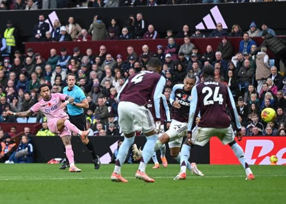 Birmingham, England, 9th November 2025. Justin Kluivert of Bournemouth shoots towards goal during the Aston Villa vs AFC Bournemouth Premier League match at Villa Park, Birmingham. Picture credit should read: Cody Froggatt Sportimage EDITORIAL USE ONLY. No use with unauthorised audio, video, data, fixture lists, club league logos or live services. Online in-match use limited to 120 images, no video emulation. No use in betting, games or single club league player publications. SPI_030_CF_ASTON_VILLA_V_BOURNEMOUTH SPI-4279-0028
