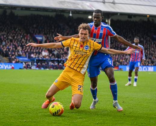 Crystal Palace v Brighton and Hove Albion Premier League Tyrick Mitchell of Crystal Palace and Mats Wieffer of Brighton and Hove Albion battle for the ball during the Premier League match at Selhurst Park, London UK Newspapers OUT Copyright: xMalcolmxFellx FIL-22486-0043