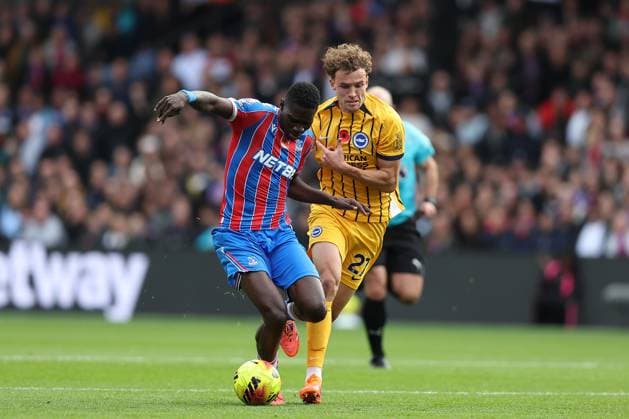 9th November 2025; Selhurst Park, Selhurst, London, England; Premier League Football, Crystal Palace versus Brighton and Hove Albion; Ismaila Sarr of Crystal Palace is fouled by Mats Wieffer of Brighton &amp; Hove Albion  KatiexChan