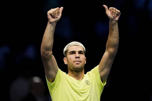 Spain s Carlos Alcaraz celebrate victory after the singles tennis match of the ATP, Tennis Herren World Tour Finals against Australia s Alex de Minaur at the Inalpi Arena in Turin, Italy - Sunday, Nov. 9, 2025. - .  Copyright: xMarcoxAlpozzi LaPressex