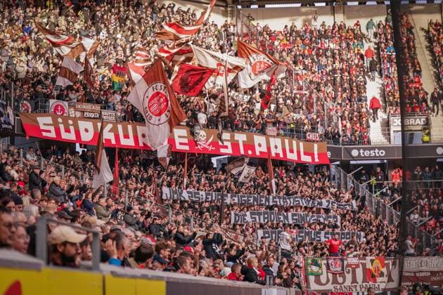 Germany, Freiburg, Europe, Bundesliga 2025 26, matchday 10 SC Freiburg vs FC St Pauli, Europa Park Stadium, guest block, fans, Ultras St Pauli, protest banners, criticism of security concepts, fan culture, curve, atmosphere, emotion, solidarity, fan movement, Bundesliga Freiburg im Breisgau Baden Württemberg Germany Copyright: xJOERANxSTEINSIEKx