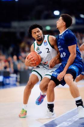 Dexter Akanno 2 Gladiators Trier with ball, Kevin McClain 3 MLP Academics Heidelberg defends easyCredit BBL MLP Academics Heidelberg - Gladiators Trier 09 11 2025 at SNP Dome, Heidelberg Dexter Akanno 2 Gladiators Trier with ball Copyright: xspeedshotx