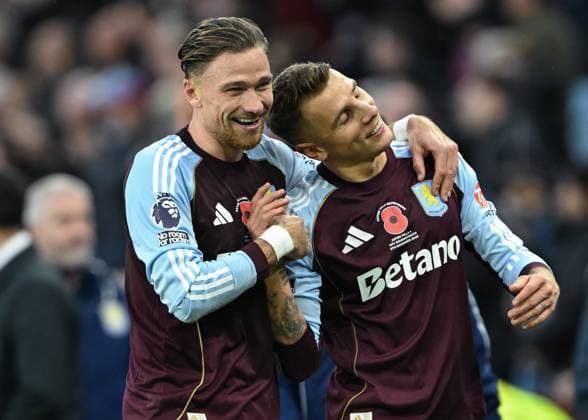 Birmingham, England, 9th November 2025. Matty Cash and Lucas Digne of Aston Villa celebrate the full time result following the Aston Villa vs AFC Bournemouth Premier League match at Villa Park, Birmingham. Picture credit should read: Cody Froggatt Sportimage EDITORIAL USE ONLY. No use with unauthorised audio, video, data, fixture lists, club league logos or live services. Online in-match use limited to 120 images, no video emulation. No use in betting, games or single club league player publications. SPI_051_CF_ASTON_VILLA_V_BOURNEMOUTH SPI-4279-0051