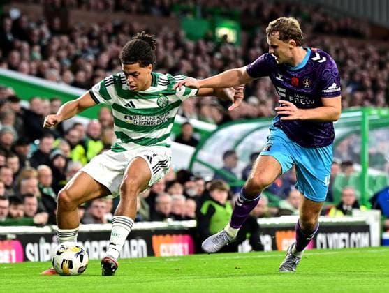 Jahmai Simpson-Pusey of Celtic and Zac Williams of Kilmarnock Celtic v Kilmarnock, William Hill Scottish Premiership, Football, Celtic Park, Glasgow, Scotland, UK - 09 Nov 2025Glasgow Celtic Park United Kingdom EDITORIAL USE ONLY No use with unauthorised audio, video, data, fixture lists, club league logos or live services. Online in-match use limited to 120 images, no video emulation. No use in betting, games or single club league player publications. Copyright: xMarkxRunnacles Shutterstockx 15702238as