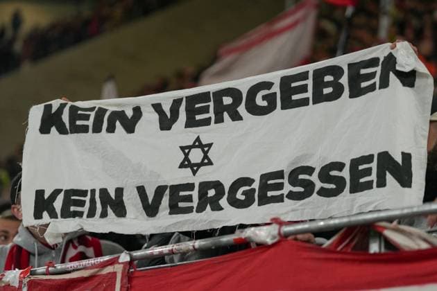 Banner of the fans and Ultras in the stands, Banner, No forgiving, no forgetting , Germany, Football, 1 Bundesliga, Matchday 10, 2025 2026, SC Freiburg vs FC St Pauli, 09 11 2025, Europa Park Stadion, Freiburg, Germany DFL REGULATIONS PROHIBIT ANY USE OF PHOTOGRAPHS AS IMAGE SEQUENCES AND OR QUASI VIDEO Freiburg Europa Park Stadion Baden Württemberg Germany Copyright: xArnexAmbergx