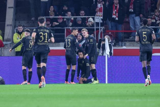 Goal celebration of the team FC Ausgburg after the 1 2 of Han Noah Massengo 4 FC Augsburg , VfB Stuttgart vs FC Augsburg, Football, Men, DFL, Bundesliga, Season 2025 2026, MHP Arena, 10 Matchday, 09 11 2025 Stuttgart Baden Wuerttemberg Germany Copyright: xkolbert-press MartinxAgüerax