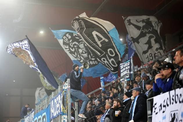 Football, Men, 3 Liga, Season 2025 2026, SSV Jahn Regensburg TSV 1860 Munich, Jahnstadion The Lions fans in their fan curve, atmosphere, flags