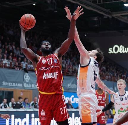 In the picture from left Eddy Edigin Wuerzburg Baskets, 27 against Sid Marlon Theis Rostock Seawolves, 19 09 11 2025, Basketball, Fitness First Wuerzburg Baskets vs Rostock Seawolves, easyCredit BBL, 7 Matchday, Germany, Wuerzburg, tectake Arena, Copyright: HMBxMedia xJulienxBecker