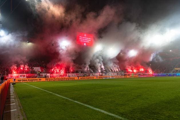 09 11 2025, Football, GER, Season, 3 Liga, Season 2025 2026, Matchday 14, SSV Jahn Regensburg TSV 1860 Munich Pyrotechnics by Regensburg fans on the Hans Jakob Tibüne DFL REGULATIONS PROHIBIT ANY USE OF PHOTOGRAPHS AS IMAGE SEQUENCES AND OR QUASI VIDEO
