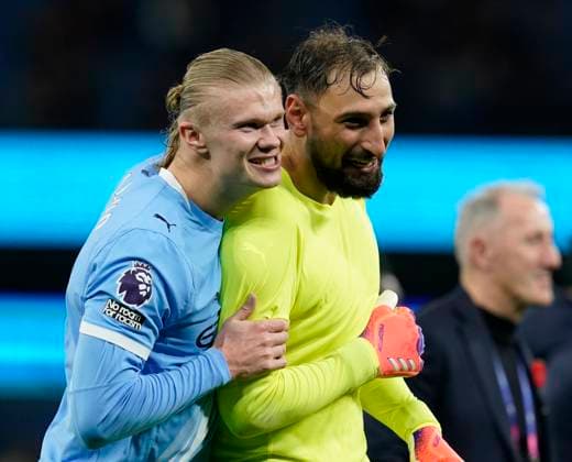 Manchester, England, 9th November 2025. Erling Haaland of Manchester City (l) celebrates the win with Gianluigi Donnarumma of Manchester City (r) during the Manchester City vs Liverpool Premier League match at the Etihad Stadium, Manchester. Picture credit should read: Andrew Yates Sportimage EDITORIAL USE ONLY. No use with unauthorised audio, video, data, fixture lists, club league logos or live services. Online in-match use limited to 120 images, no video emulation. No use in betting, games or single club league player publications. SPI_094_AY_Man_City_Liverpool SPI-4280-0090