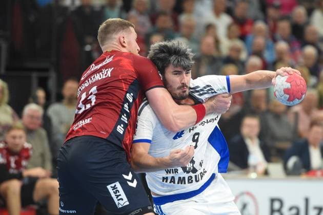 Handball I Men I Season 2025 2026 I Bundesliga I 11 Matchday I SG Flensburg Handewitt HSV Hamburg I 09 11 2025 from left Blaz Blagotinsek 43, SG Flensburg Handewitt , Jacob Arenth Lassen 9, HSV Hamburg Copyright: xLobeca JanxKirschnerx