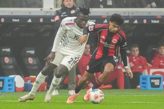 Nathaniel Brown Eintracht Frankfurt, 21 vs Danny da Costa 1 FSV Mainz 05, 21 Frankfurt 09 11 2025 Eintracht Frankfurt vs 1 FSV Mainz 05, Deutsche Bank Park, Matchday 10 Bundesliga