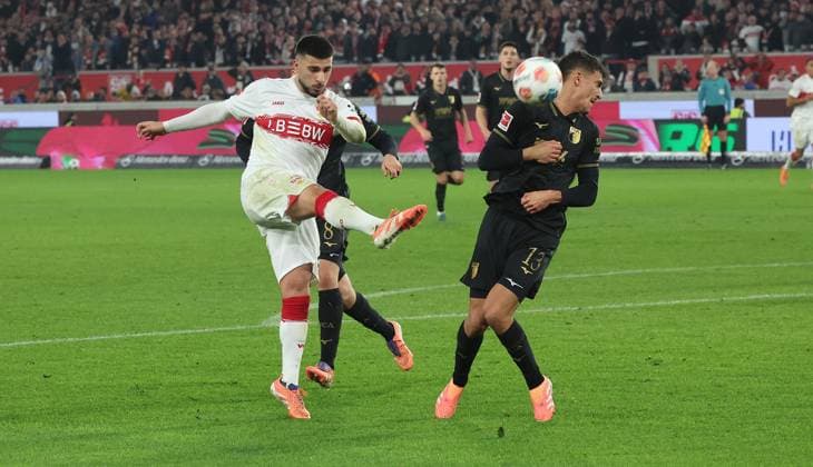 Stuttgart , Bundesliga Soccer VfB Stuttgart vs FC Augsburg , from left Deniz Undav VfB Dimitrios Giannoulis Augsburg According to the regulations of the DFL German Soccer League, it is prohibited to use or have used photographs taken in the stadium and or of the match in the form of sequential images and or video-like photo series
