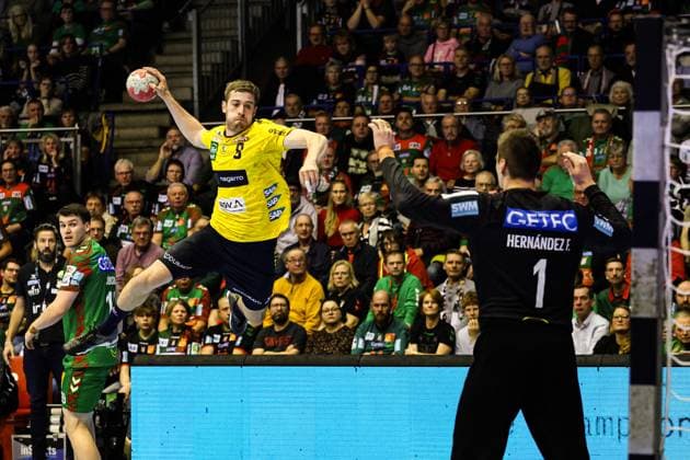 Tim Nothdurft Rhein Neckar Löwen,8 vs Goalkeeper Sergey Hernandez Ferrer SC Magdeburg,1 Handball Bundesliga Season 2025 2026 SC Magdeburg vs Rhein Neckar Löwen at the GETEC Arena in Magdeburg Action,Handball,Germany,09 11 2025