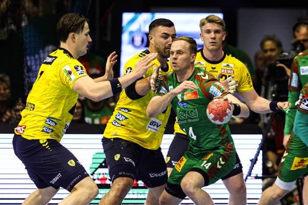 Omar Ingi Magnusson SC Magdeburg,14 vs Jannik Kohlbacher Rhein Neckar Löwen,80 Handball Bundesliga Season 2025 2026 SC Magdeburg vs Rhein Neckar Löwen at the GETEC Arena in Magdeburg Action,Handball,Germany,09 11 2025