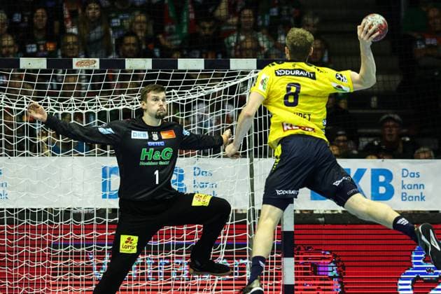 Goalkeeper Sergey Hernandez Ferrer SC Magdeburg,1 vs Tim Nothdurft Rhein Neckar Löwen,8 Handball Bundesliga Season 2025 2026 SC Magdeburg vs Rhein Neckar Löwen at the GETEC Arena in Magdeburg Action,Handball,Germany,09 11 2025