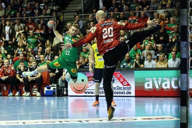 Lukas Mertens SC Magdeburg,22 vs Goalkeeper Mike Jensen Rhein Neckar Löwen,20 Handball Bundesliga Season 2025 2026 SC Magdeburg vs Rhein Neckar Löwen at the GETEC Arena in Magdeburg Action,Handball,Germany,09 11 2025