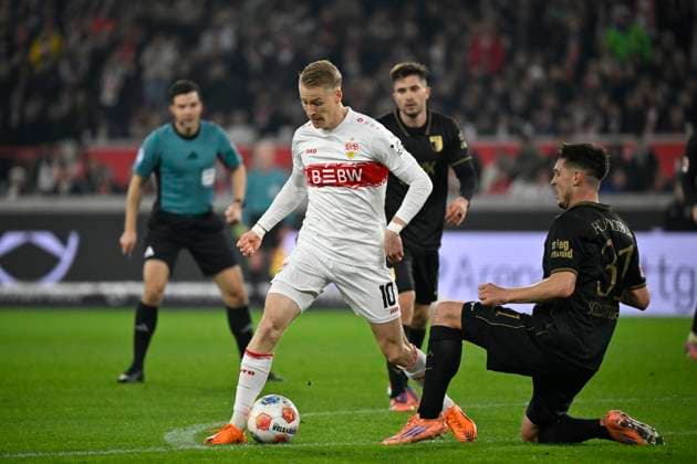 Chris Fuehrich VfB Stuttgart 10 Action on the ball tackle, action against Keven Schlotterbeck FC Augsburg FCA 31 Referee Referee Harm Osmers VfB Stuttgart vs FC Augsburg FCA 09 11 2025 DFL REGULATIONS PROHIBIT ANY USE OF PHOTOGRAPHS AS IMAGE SEQUENCES AND OR QUASI VIDEO VfB Stuttgart vs FC Augsburg FCA