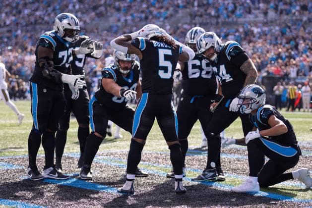 November 9, 2025: Carolina Panthers running back Rico Dowdle (5) celebrates after a touchdown against the New Orleans Saints in the first half of the NFL, American Football Herren, USA matchup in Charlotte, NC. ( CSM) Charlotte United States - ZUMAc04_ 20251109_zma_c04_043 Copyright: xScottxKinserx