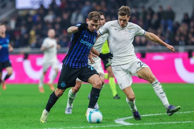 FC Internazionale vs SS Lazio Serie A 2025 26 09 11 2025 Nicolo Barella of FC Internazionale competes for the ball with Toma Basic of SS Lazio during Serie A 2025 26 football match between FC Internazionale and SS Lazio at San Siro Stadium in Milan Copyright: xBEAUTIFULxSPORTS Carabellix