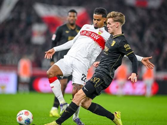 Lorenz Assignon (VfB Stuttgart) und Anton Kade (FC Augsburg) im Zweikampf waehrend des spiels der Bundesliga zwischen VfB Stuttgart und FC Augsburg, MHPArena Stuttgart am 09. November 2025 in Stuttgart, Deutschland. (Foto von Harry Langer DeFodi Images) +++ Lorenz Assignon (VfB Stuttgart) und Anton Kade (FC Augsburg) battle for the ball during the Bundesliga match between VfB Stuttgart and FC Augsburg at MHPArena Stuttgart on November 9, 2025 in Stuttgart, Germany. (Photo by Harry Langer DeFodi Images) DFL regulations prohibit any use of photographs as image sequences and or quasi-video. (Photo by Harry Langer DeFodi Images) DFL regulations prohibit any use of photographs as image sequences and or quasi-video. Lorenz Assignon VfB Stuttgart und Anton Kade FC Augsburg im Zweikampf waehrend des spiels der Bundesliga zwischen VfB Stuttgart und FC Augsburg, MHPArena Stuttgart am 09 November 2025 in Stuttgart, Germany Photo by Harry Langer DeFodi Images Lorenz Assignon VfB Stuttgart und Anton Kade FC Augsburg battle for the ball during the Bundesliga match between VfB Stuttgart and FC Augsburg at MHPArena Stuttgart on November 9, 2025 in Stuttgart, Germany Photo by Harry Langer DeFodi Images DFL regulations prohibit any use of photographs as image sequences and or quasi video Photo by Harry Langer DeFodi Images DFL regulations prohibit any use of photographs as image sequences and or quasi video