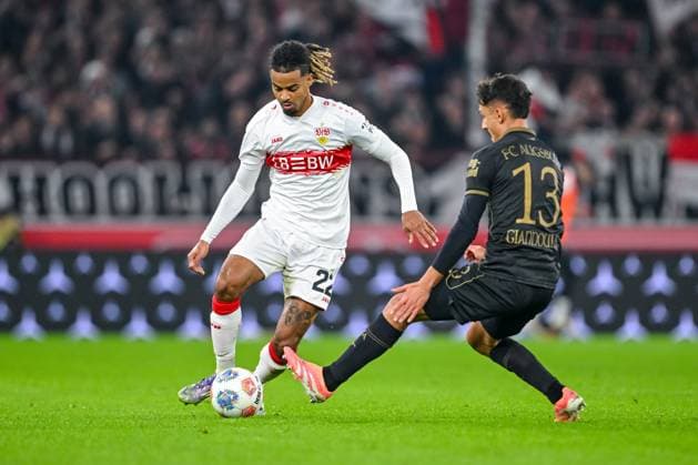 Lorenz Assignon (VfB Stuttgart) und Dimitris Giannoulis (FC Augsburg) im Zweikampf waehrend des spiels der Bundesliga zwischen VfB Stuttgart und FC Augsburg, MHPArena Stuttgart am 09. November 2025 in Stuttgart, Deutschland. (Foto von Harry Langer DeFodi Images) +++ Lorenz Assignon (VfB Stuttgart) und Dimitris Giannoulis (FC Augsburg) battle for the ball during the Bundesliga match between VfB Stuttgart and FC Augsburg at MHPArena Stuttgart on November 9, 2025 in Stuttgart, Germany. (Photo by Harry Langer DeFodi Images) DFL regulations prohibit any use of photographs as image sequences and or quasi-video. (Photo by Harry Langer DeFodi Images) DFL regulations prohibit any use of photographs as image sequences and or quasi-video. Lorenz Assignon VfB Stuttgart and Dimitris Giannoulis FC Augsburg in a duel during the Bundesliga match between VfB Stuttgart and FC Augsburg, MHPArena Stuttgart on November 09, 2025 in Stuttgart, Germany Photo by Harry Langer DeFodi Images Lorenz Assignon VfB Stuttgart and Dimitris Giannoulis FC Augsburg battle for the ball during the Bundesliga match between VfB Stuttgart and FC Augsburg at MHPArena Stuttgart on November 9, 2025 in Stuttgart, Germany Photo by Harry Langer DeFodi Images DFL regulations prohibit any use of photographs as image sequences and or quasi video Photo by Harry Langer DeFodi Images DFL regulations prohibit any use of photographs as image sequences and or quasi video