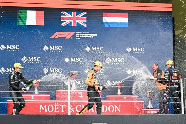 Lando Norris of McLaren, Kimi Antonelli of Mercedes-AMG, Max Verstappen of Red Bull and Mark Norris, Director of Commercial Trackside Operations at McLaren on the podium after the F1 Grand Prix of Brazil at Autodromo Jose Carlos Pace on November 09, 2025 in Sao Paulo, Brazil. (Photo by Richard Callis SPP)  Copyright: xRichardxCallis SPPx Sportspressphoto_SPR59980