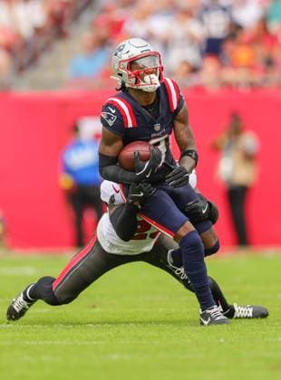 November 9, 2025, Tampa, Florida, USA: New England Patriots wide receiver STEFON DIGGS (8) is tackled by Tampa Bay Buccaneers safety TYKEE SMITH (23) at the National Football League Week 10 game between the New England Patriots and the Tampa Bay Buccaneers, New England Patriots win 28-23, at Raymond James Stadium. Tampa USA - ZUMAs335 20251109_znp_s335_019 Copyright: xMatthewxSmithx