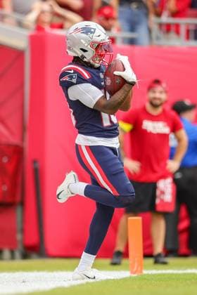 November 9, 2025, Tampa, Florida, USA: New England Patriots wide receiver KYLE WILLIAMS (18) celebrates a touchdown at the National Football League Week 10 game between the New England Patriots and the Tampa Bay Buccaneers, New England Patriots win 28-23, at Raymond James Stadium. Tampa USA - ZUMAs335 20251109_znp_s335_014 Copyright: xMatthewxSmithx