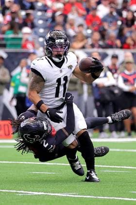 November 9, 2025, Houston, Texas, U.S: Jacksonville Jaguars wide receiver Parker Washington (11) is tackled by Houston Texans safety Calen Bullock (2) after a catch during the third quarter of the NFL, American Football Herren, USA game between the Houston Texans and the Jacksonville Jaguars at NRG Stadium in Houston, TX on November 9, 2025. Houston won, 36-29. Houston U.S - ZUMAw137 20251109_aap_w137_051 Copyright: xErikxWilliamsx