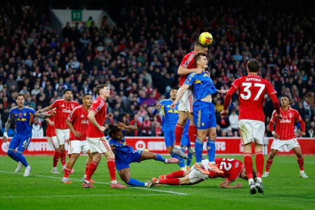 Nottingham, England, 9th November 2025. Nikola Milenkovic of Nottingham Forest challenging for the ball at this Nottingham Forest corner during the Nottingham Forest vs Leeds United Premier League match at the City Ground, Nottingham. Picture credit should read: James Baylis Sportimage EDITORIAL USE ONLY. No use with unauthorised audio, video, data, fixture lists, club league logos or live services. Online in-match use limited to 120 images, no video emulation. No use in betting, games or single club league player publications. SPI_151_JB_NOTTS_FOREST_LEEDS SPI-4278-0150
