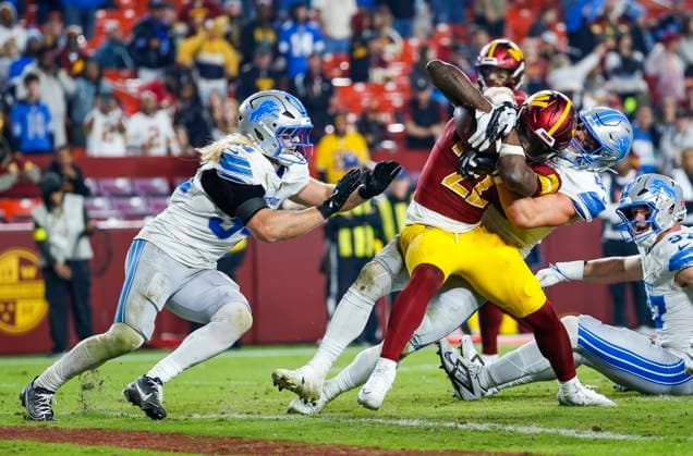 Nov 9, 2025: Washington Commanders RB 22 Jacory Croskey-Merritt is stopped from making a two point conversion during the Washington Commanders game against the Detroit Lions at Northwest Stadium in Landover, MD. CSM Landover United States of America - ZUMAc04_ 20251109_zma_c04_254 Copyright: xJustinxCooperx