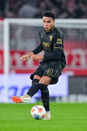 Noahkai Banks (FC Augsburg) in Aktion, am Ball, Einzelaktion waehrend des spiels der Bundesliga zwischen VfB Stuttgart und FC Augsburg, MHPArena Stuttgart am 09. November 2025 in Stuttgart, Deutschland. (Foto von Harry Langer DeFodi Images) +++ Noahkai Banks (FC Augsburg) controls the Ball during the Bundesliga match between VfB Stuttgart and FC Augsburg at MHPArena Stuttgart on November 9, 2025 in Stuttgart, Germany. (Photo by Harry Langer DeFodi Images) DFL regulations prohibit any use of photographs as image sequences and or quasi-video. (Photo by Harry Langer DeFodi Images) DFL regulations prohibit any use of photographs as image sequences and or quasi-video. Noahkai Banks FC Augsburg in action, am Ball, Einzelaktion waehrend des spiels der Bundesliga zwischen VfB Stuttgart und FC Augsburg, MHPArena Stuttgart am 09 November 2025 in Stuttgart, Germany Photo by Harry Langer DeFodi Images Noahkai Banks FC Augsburg controls the Ball during the Bundesliga match between VfB Stuttgart and FC Augsburg at MHPArena Stuttgart on November 9, 2025 in Stuttgart, Germany Photo by Harry Langer DeFodi Images DFL regulations prohibit any use of photographs as image sequences and or quasi video Photo by Harry Langer DeFodi Images DFL regulations prohibit any use of photographs as image sequences and or quasi video
