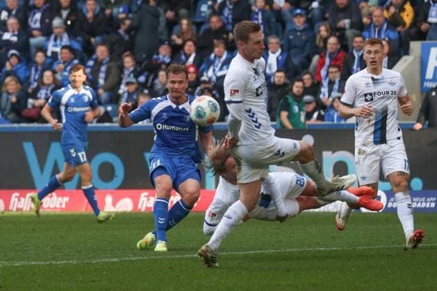 09 11 2025, xgox, Soccer 2 Bundesliga, 1 FC Magdeburg SC Paderborn 07 emspor, v l Alexander Ahl Holmstroem Magdeburg, 12 shoots the ball on goal, shot on goal, shot DFL DFB REGULATIONS PROHIBIT ANY USE OF PHOTOGRAPHS as IMAGE SEQUENCES and or QUASI VIDEO Magdeburg