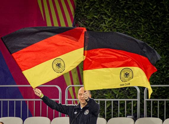 Soccer FIFA U17, U 17 World Cup Qatar 2025 El Salvador vs Germany Group G Match 61 German fan, flag Copyright: xRedhaxHosnixSegganix