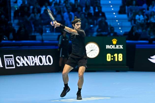10th November 2025; Palasport Olimpico Arena, Turin, Italy; Nitto ATP, Tennis Herren Finals Tennis 2025; Lorenzo Musetti of Italy plays a backhand against Taylor Fritz of the United States  BestxImages