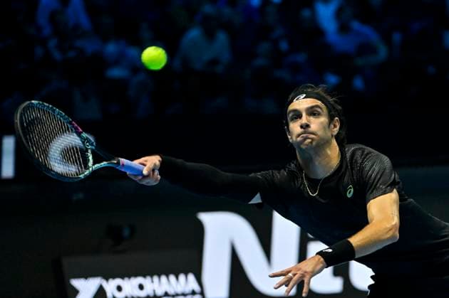10th November 2025; Palasport Olimpico Arena, Turin, Italy; Nitto ATP, Tennis Herren Finals Tennis 2025; Lorenzo Musetti of Italy plays a backhand against Taylor Fritz of the United States  BestxImages